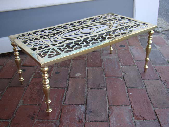 A large Victorian brass trivet circa 1860-1880